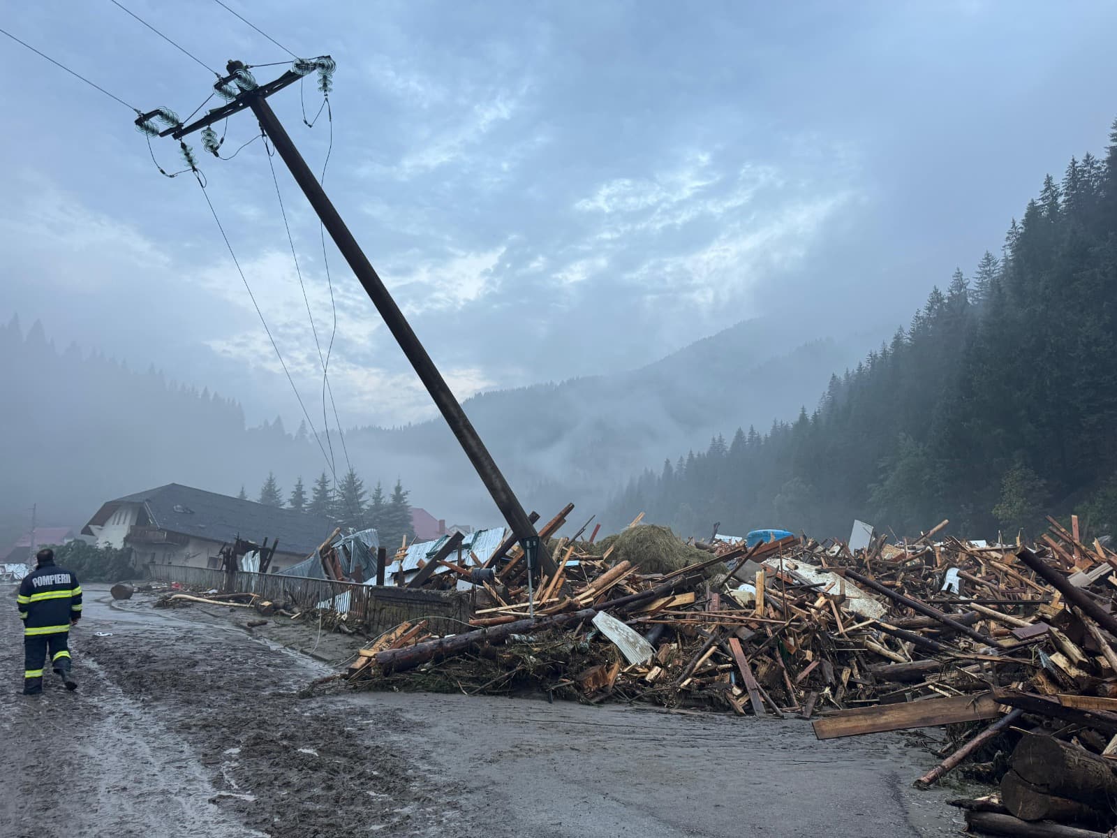 One dead, hundreds evacuated or cut off after heavy rains cause floods in north-east Romania